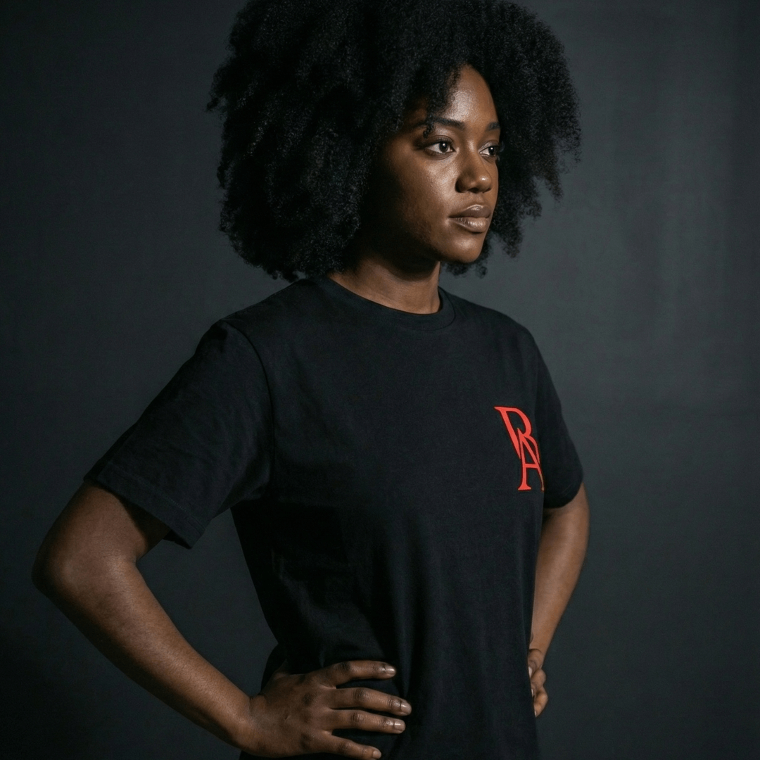 Female Model showcasing side view of boss leader dreamer heavyweight tee