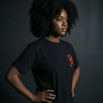 Female Model showcasing side view of boss leader dreamer heavyweight tee