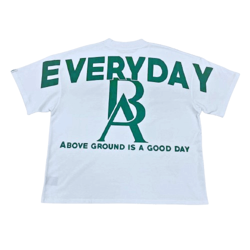 Back view of Boss Ambitionz Everyday Luxe' Oversized Heavyweight Cotton Tee which features bold evergreen text "Everyday Above Ground Is A Good Day" 