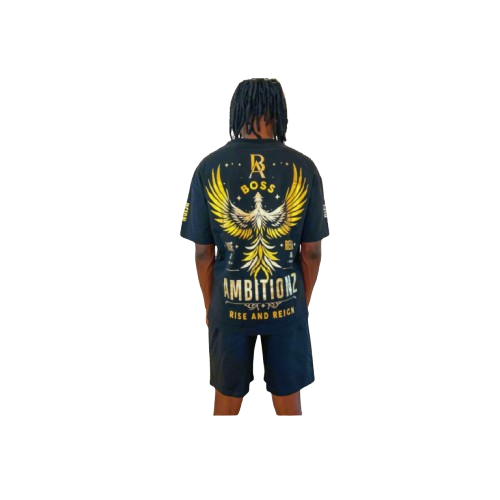 Back view of model showcasing Boss Ambitionz design: "Back view of model showcasing the Boss Ambitionz t-shirt with a striking gold winged emblem and 'Rise and Reign' slogan, paired with black shorts.