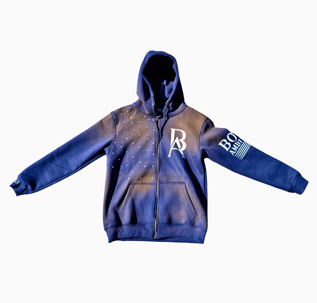 A zip-up hoodie with rhinestone detailing and an acid-wash finish, featuring the 'Boss Ambitionz' logo.
