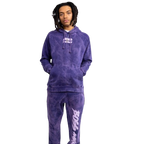Male model showcasing Boss Ambitionz Purple Haze Joggers