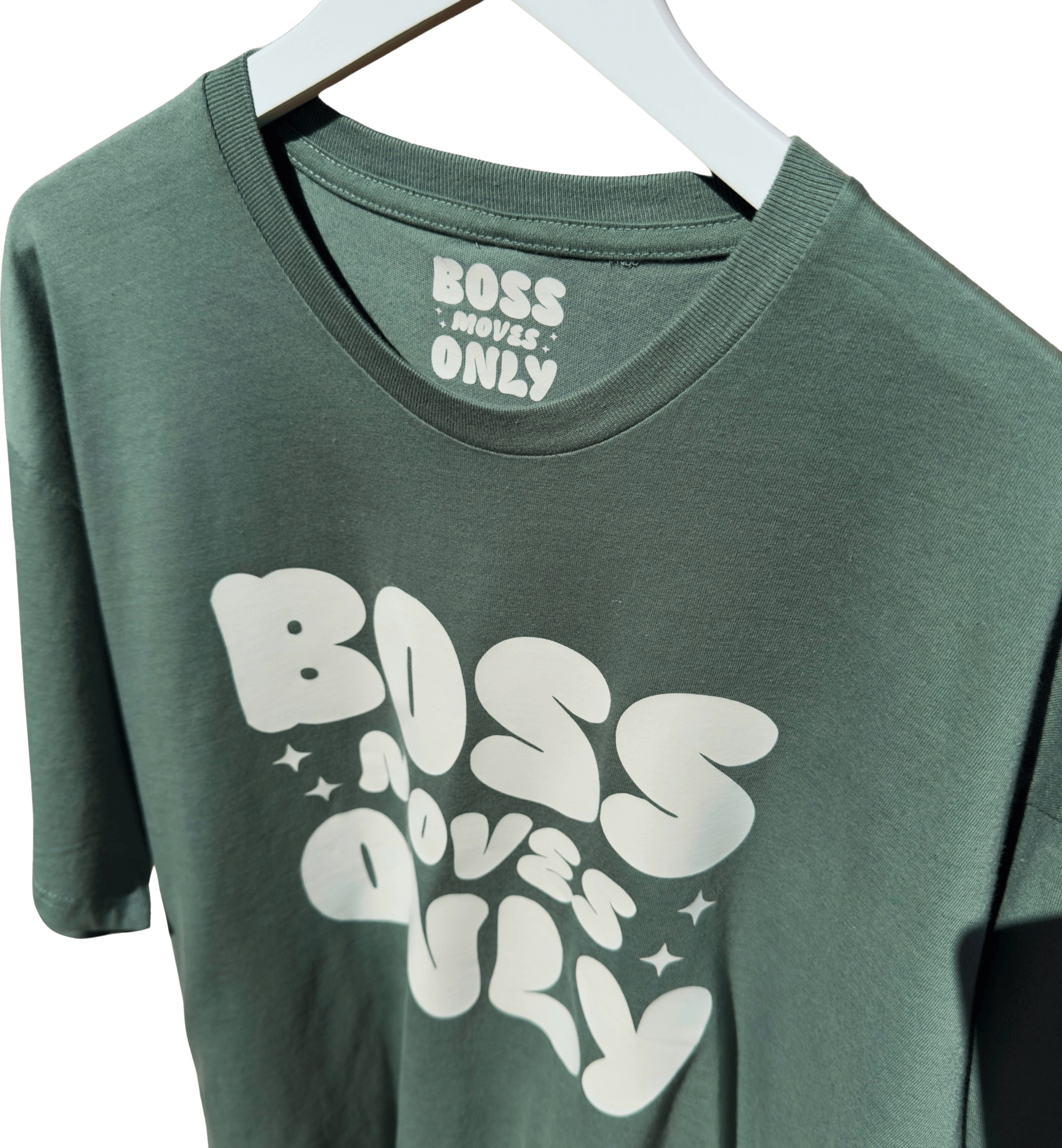 Photo of Matcha Mint Boss Moves Only Tee hanging on a white hanger with transparent background.
