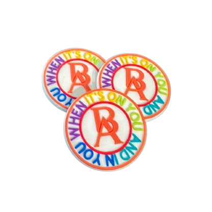 Product pic showcasing Boss Ambitionz Rainbow Signature Croc Charms 