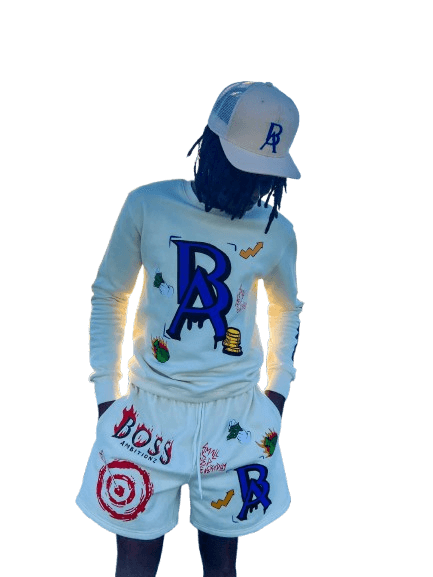 Model showcasing the Signature Trucker Hat by Boss Ambitionz and wearing the Cream Legacy Luxe Ensemble.