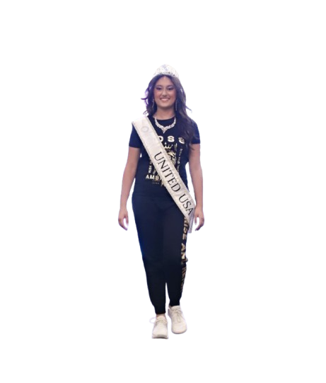 Promo pic starring RIhanna wearing the women's Regal Lioness tee with her USA Pageant Sash wrapped around her shoulder. 