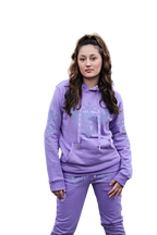 Rihanna showcasing front view of Boss Ambitionz Lavender Luxe Reflective Hoodie