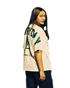Rihanna standing in a fierce pose showcasingBoss Ambitionz Everyday Luxe' Oversized Heavyweight Cotton Tee