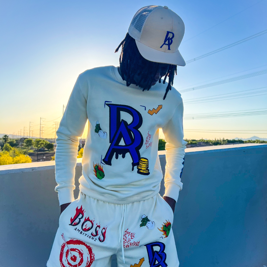 Dakidswagg rocking the new HIghrise trucker hat and Cream Legacy Luxe shortset by Boss Ambitionz